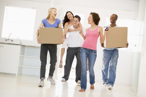 Removal team handling same day moving boxes in Paddington