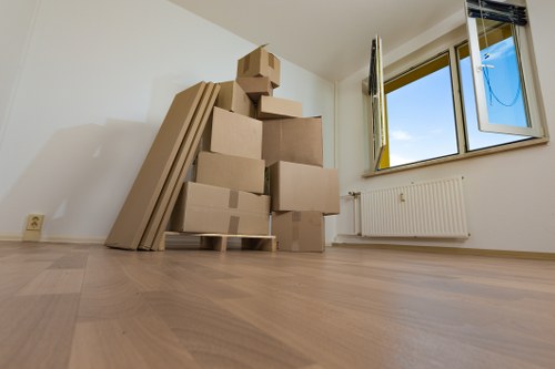Packing boxes and furniture for a Paddington removal van move