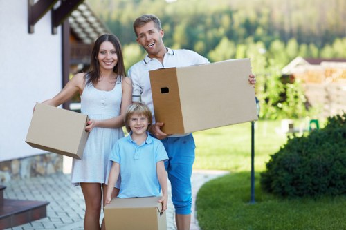 Local furniture removal service preparing items for transport in Paddington
