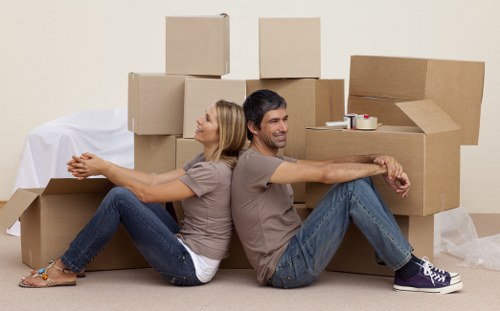 Professional piano removals team preparing an upright piano move in Paddington