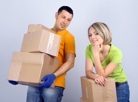 Professional furniture removals service in Paddington with moving truck and wrapped items