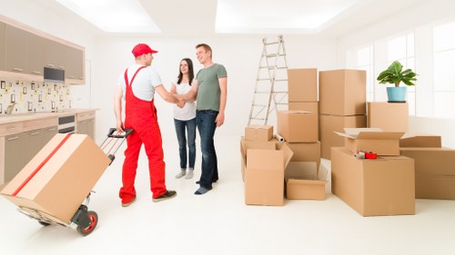 Office furniture and IT equipment being prepared for safe relocation in Paddington