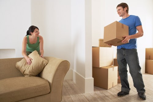 Professional movers loading furniture in Paddington